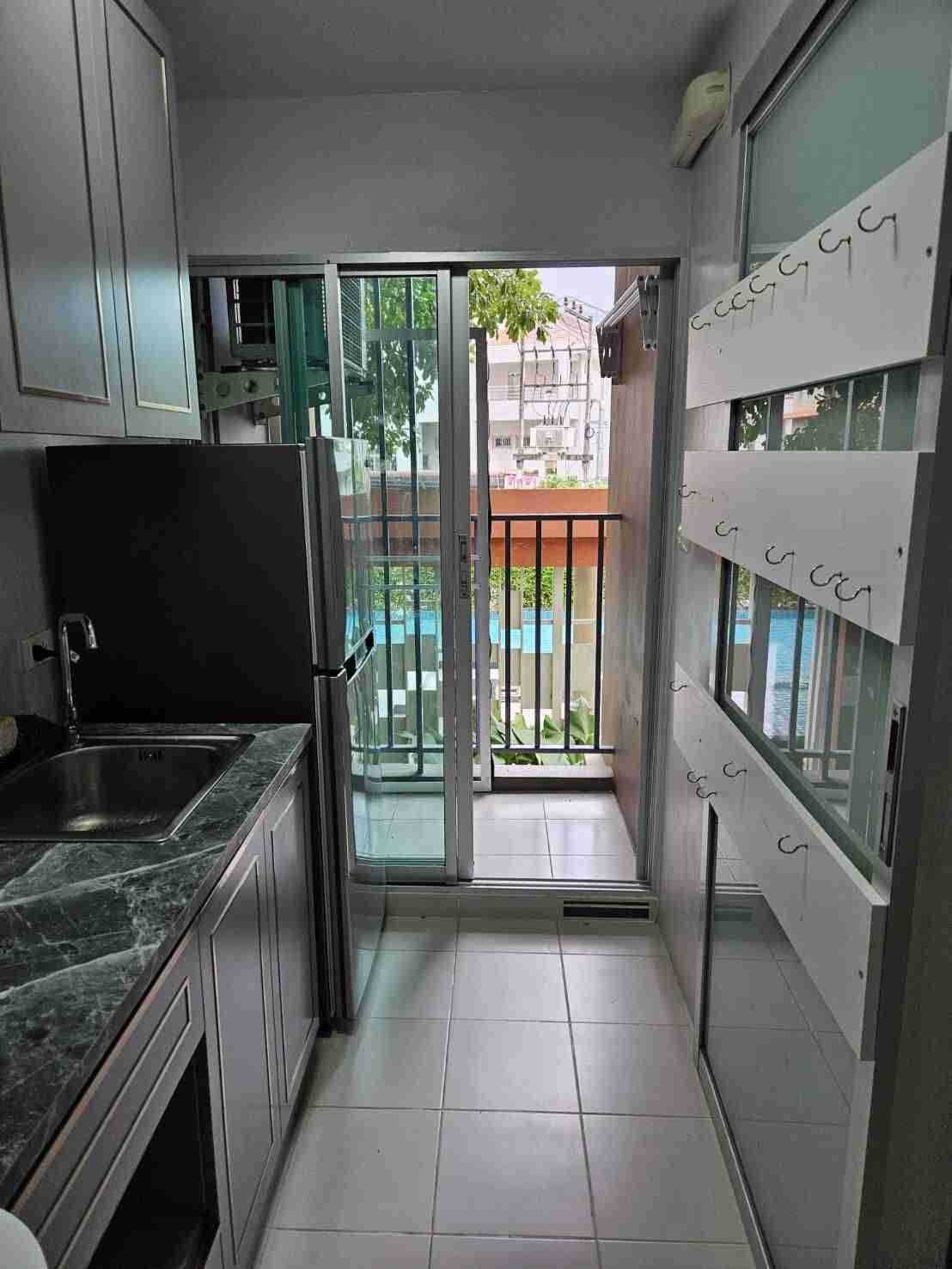 1697010050793 - condo kitchen patio